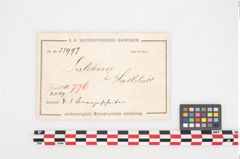 Etikett zu Bronzehelmbesatzscheiben (NHMW-PRAE-025997)